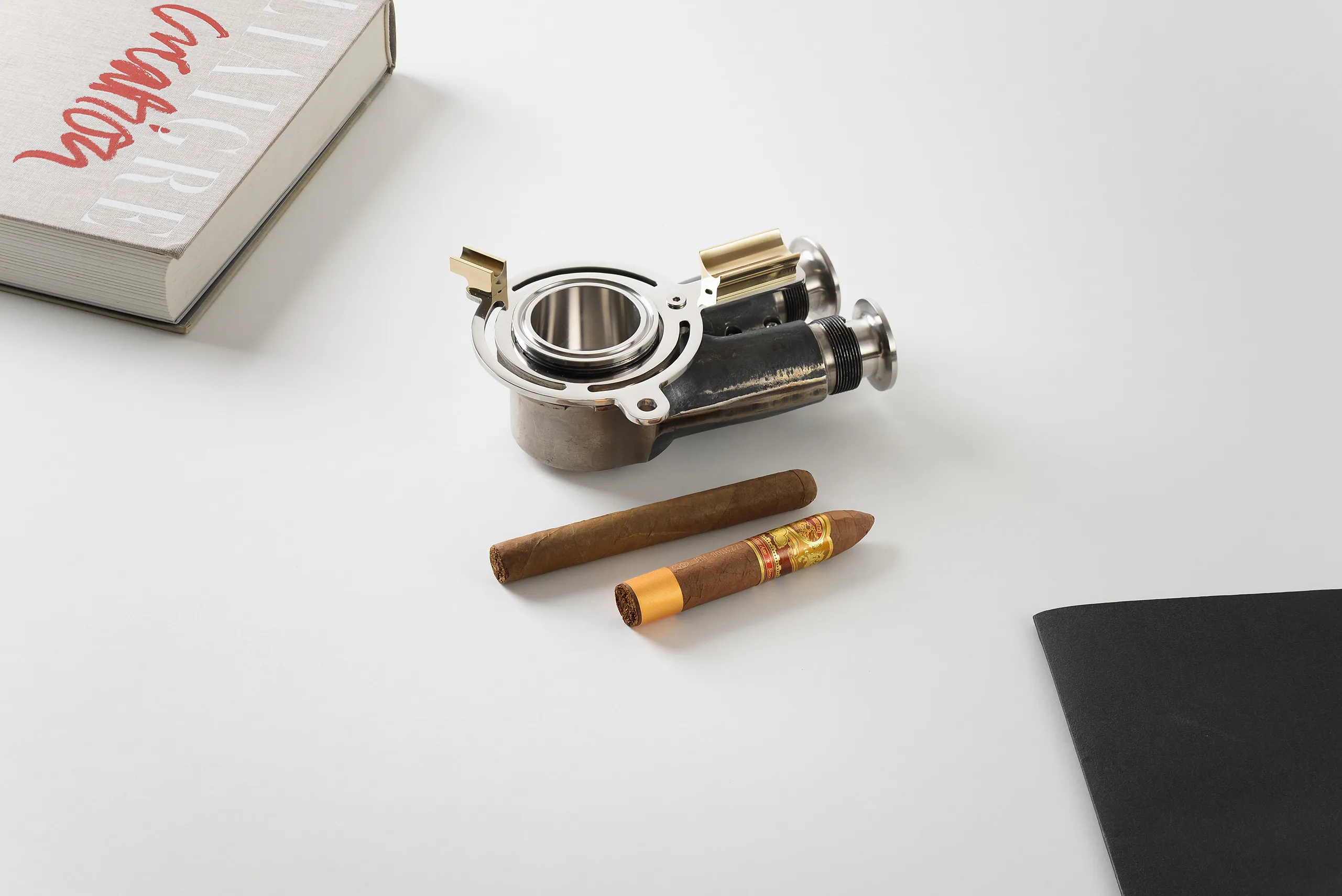 Vrod limited-edition designer ashtray scene, precision-machined in a manual workshop from honest materials.